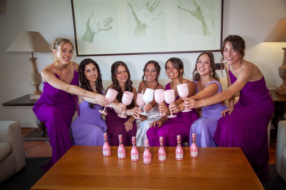 Bride and bridemaids toasting