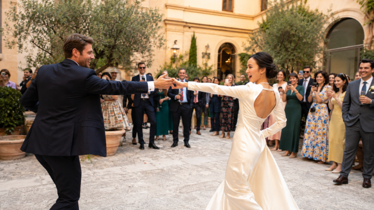 European and Asian couple during their first dance at their destination wedding in Spain
